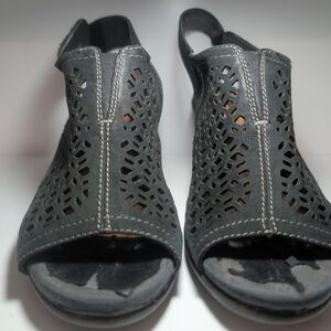 Earth Black Cascade Cutout Wedge Sandals